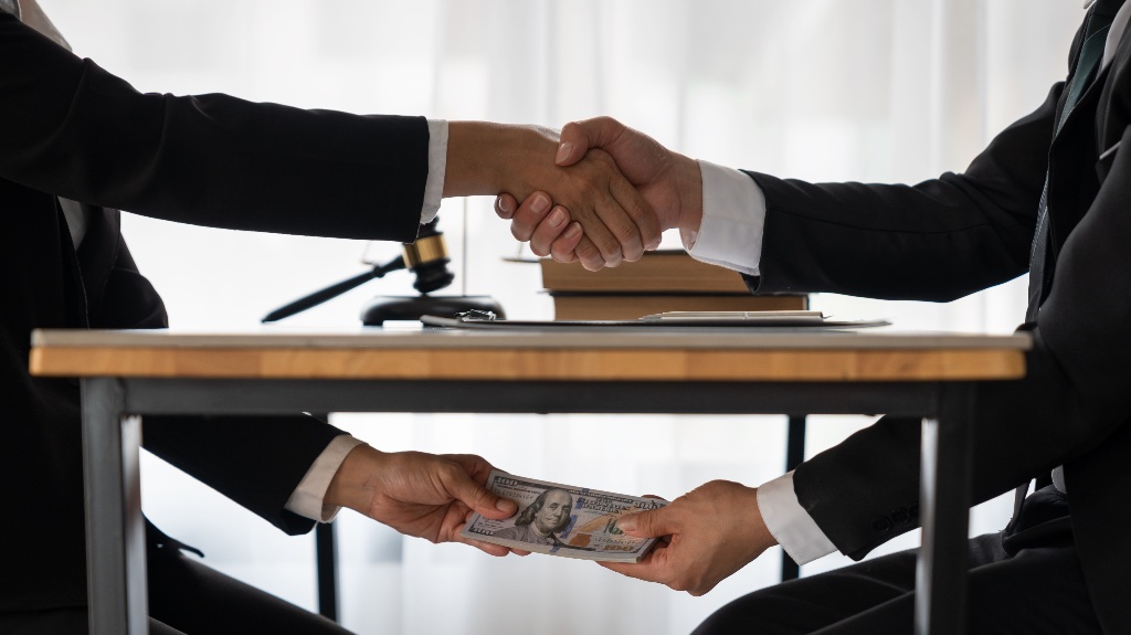 Money being given under the table
