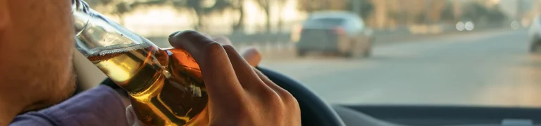 Person drinking and driving