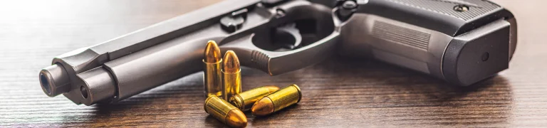 Firearm and bullets around It