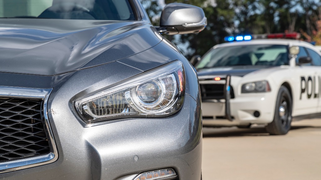 Cop pulling over car