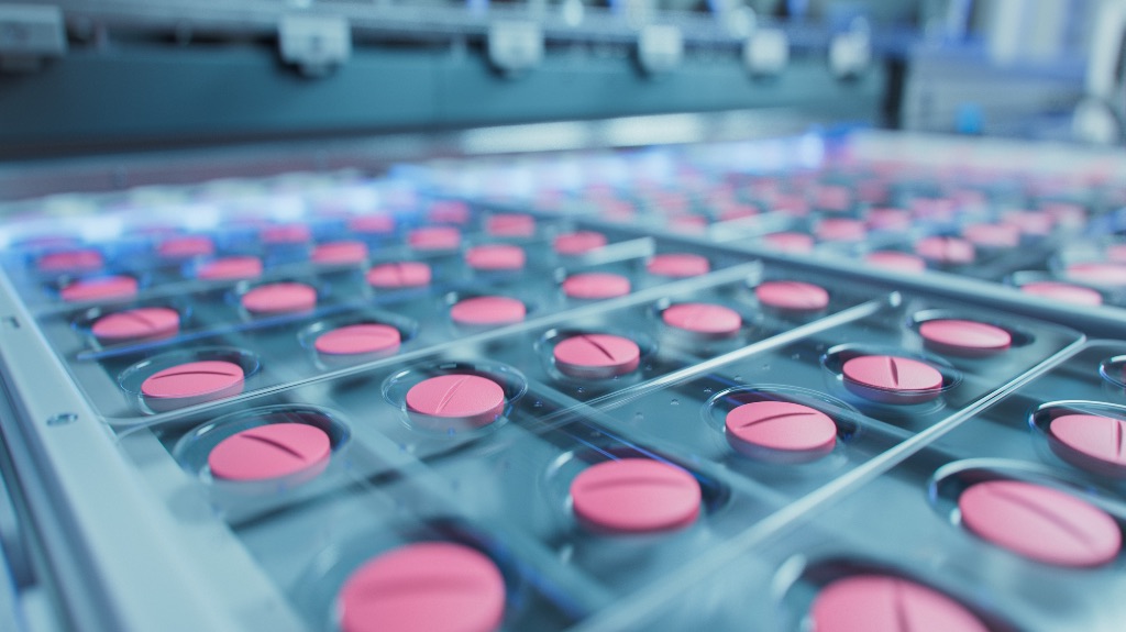 Pink pills being made