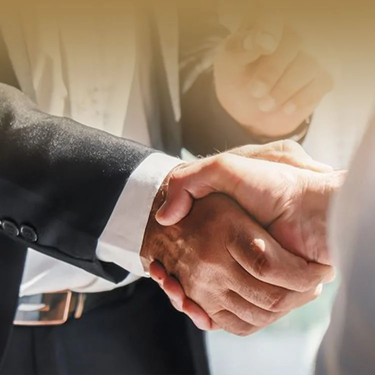 a close-up of a handshake