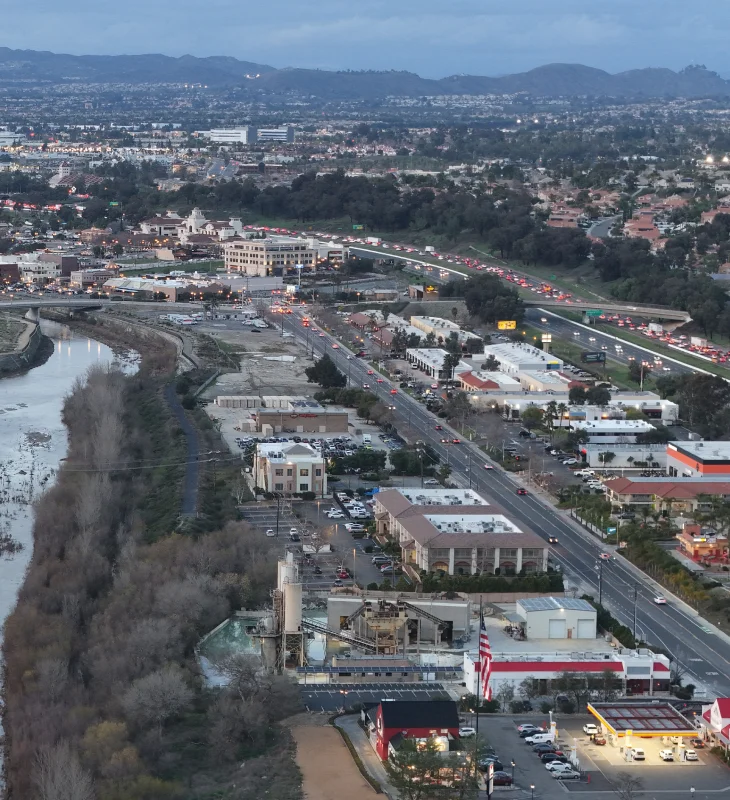 a city with a river and buildings