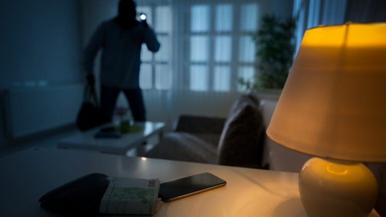 burglar breaking into a residential building