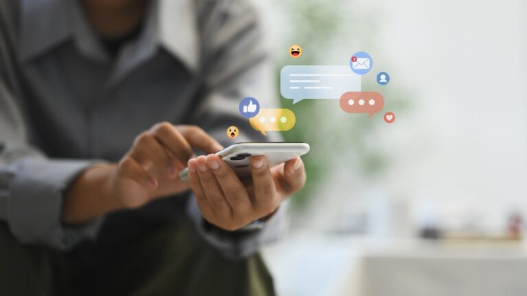 Woman using smartphone with social media icons and notification badges